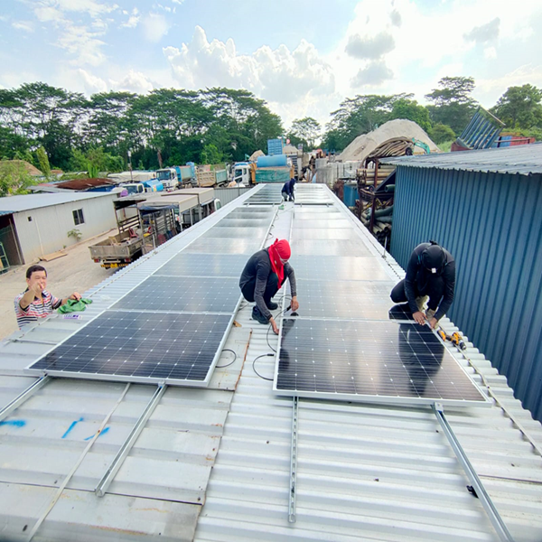 Solar panel installation on a workers' dormitory in Jalan Lekar