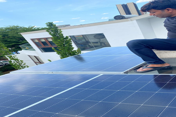 Solar panels installed on the client's glass awning